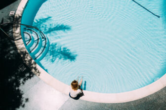 woman sitting poolside at avalon beverly hills