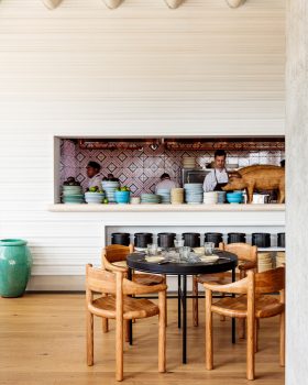 La Piscina table seating with view of chefs kitchen