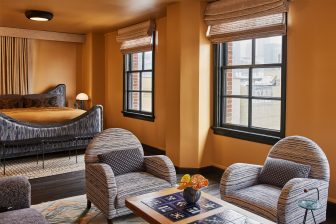 Pool suite king bedroom with seating area